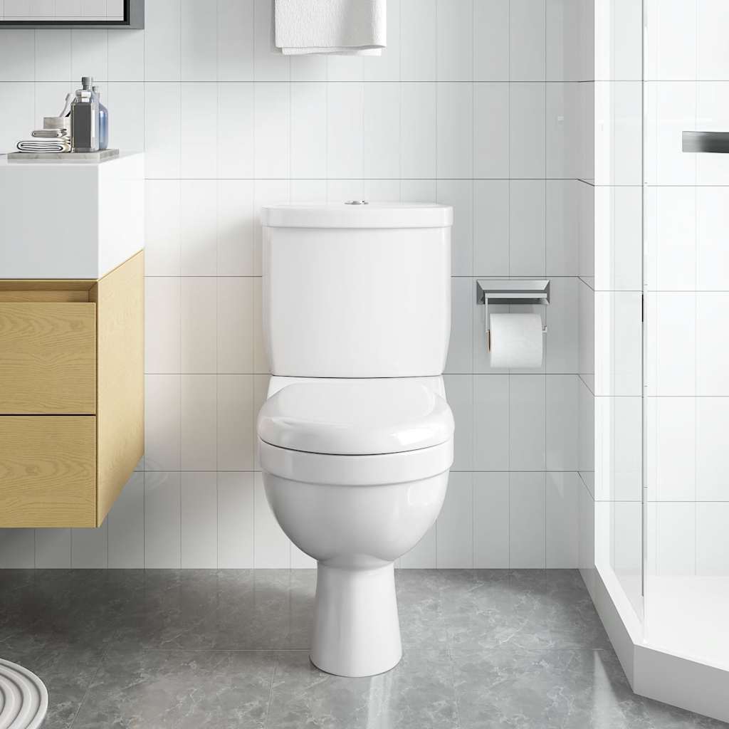 Toilette mit Spülkasten Weiß